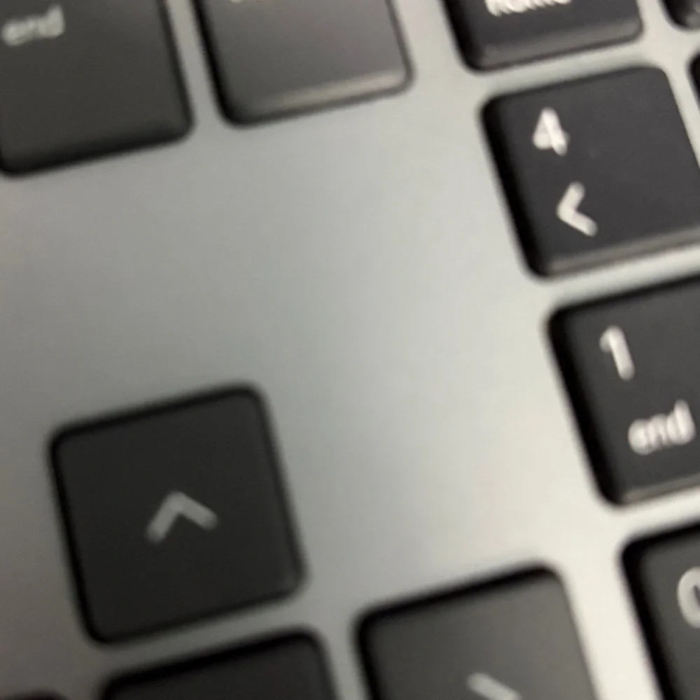 Sleek Black and Silver Laptop Keyboard